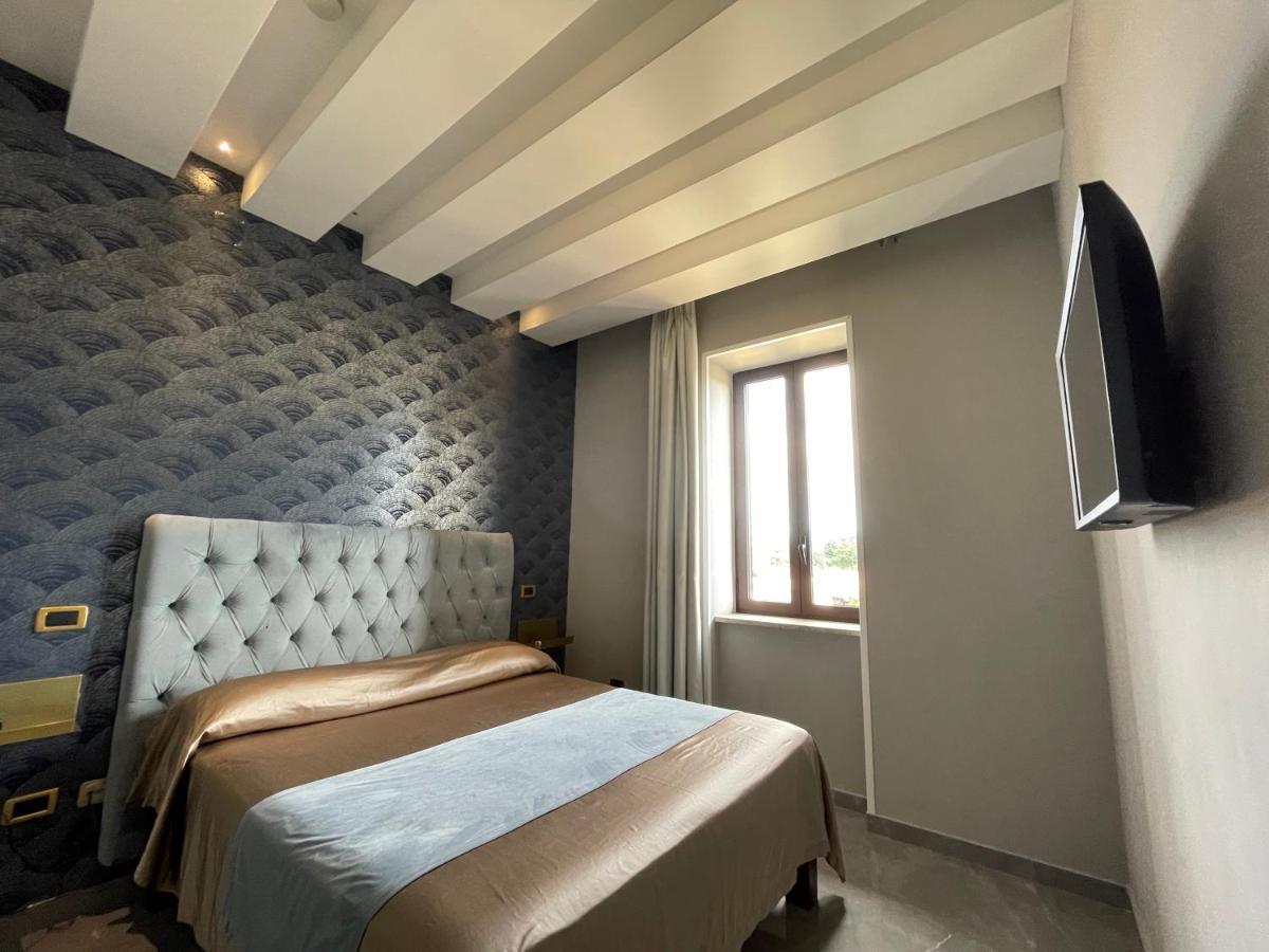 Ninfa Hotel Квалиано Экстерьер фото